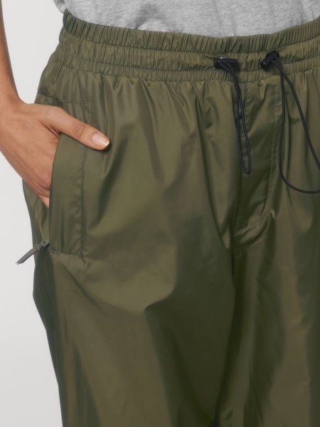 Pantalon coupe-vent Cycler en coloris british khaki