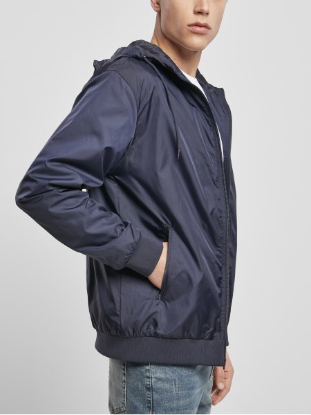 Veste coupe-vent personnalisable BY016 en coloris Navy Vue de profil de la veste coupe-vent personnalisable BY016 en coloris Navy
