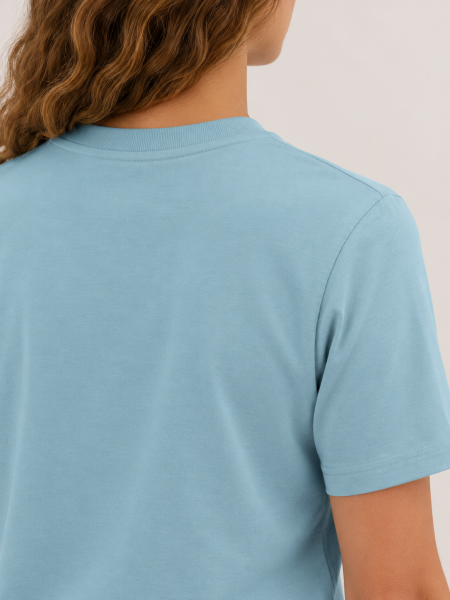 une femme de dos portant le Creator 2.0 en coloris pebble blue, vue détaillé à personnaliser