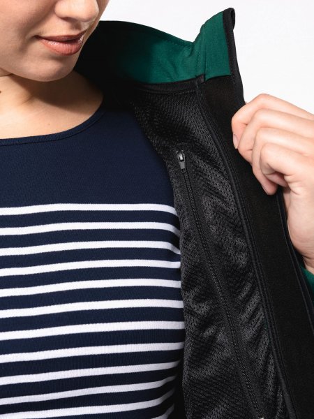 zoom sur la poche intérieure de la Veste softshell à capuche amovible femme Personnalisable 