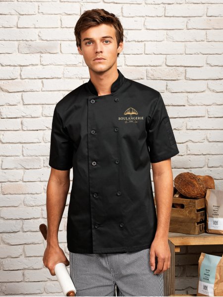 Veste de cuisinier PR656 en coloris noir avec exemple de logo imprimé sur le coeur Veste de cuisinier PR656 en coloris noir avec exemple de logo imprimé sur le coeur