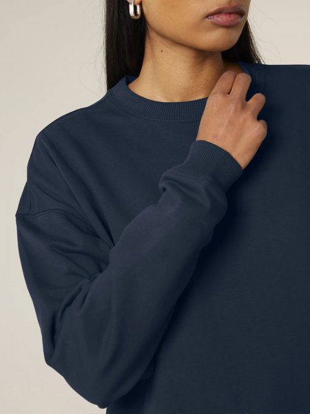 Zoom sur le col et les manches du sweat Radder 2.0 en coloris blanc Zoom sur le col et les manches du sweat Radder 2.0 en coloris blanc
