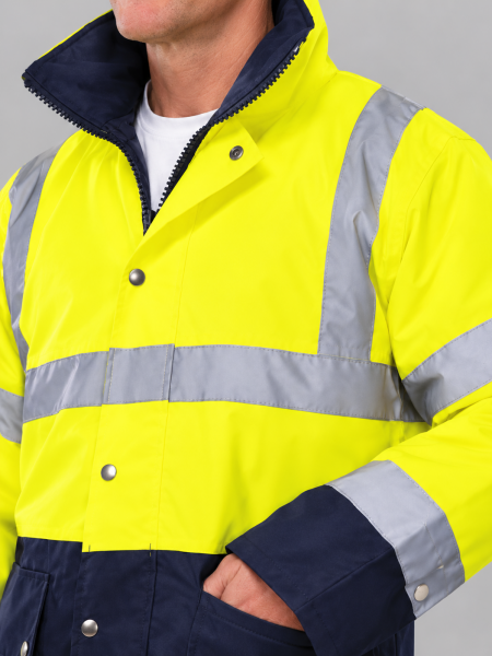 Mannequin homme de face portant la veste de sécurité bicolore haute visibilité YHVP302 en coloris Hi Viz Yellow / Navy vue détaillée