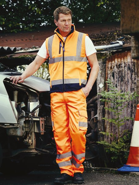 Pantalon de sécurité orange fluo avec bandes réfléchissantes Pantalon de sécurité orange fluo avec bandes réfléchissantes