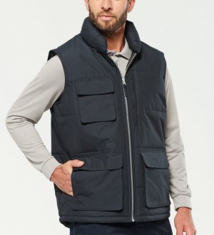 Bodywarmer matelassé WK615 en coloris Dark Grey Bodywarmer matelassé unisexe WK615 en coloris Dark Grey sans logo