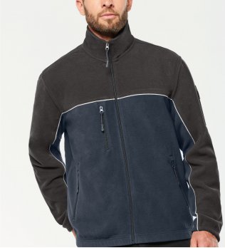 Veste polaire unisexe contrastée WK904 en coloris navy / dark grey porté par un homme